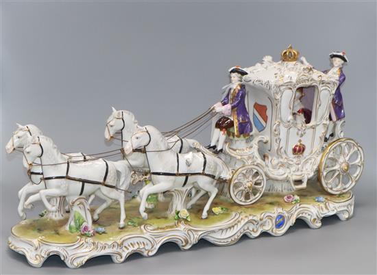 A Continental porcelain horse and carriage length 60cm